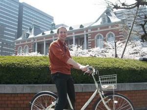 Riding the Muji e-bike through Tokyo during cherry blossom season